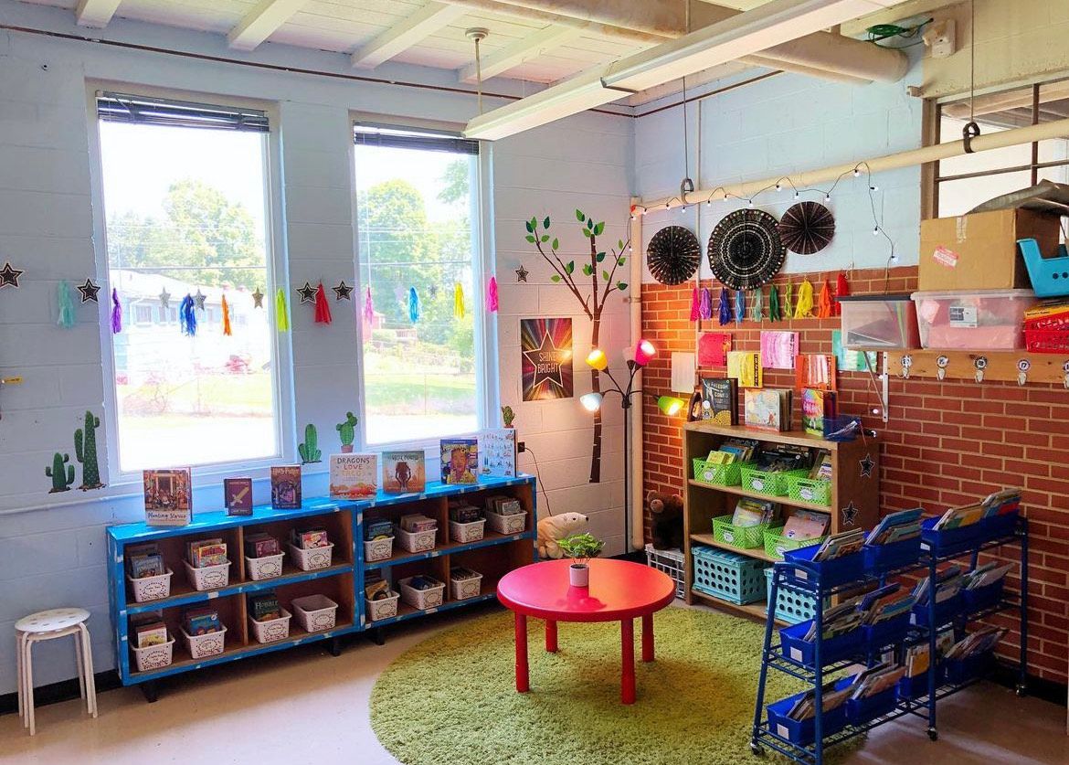 A classroom library stocked with books by Moms for Social Justice