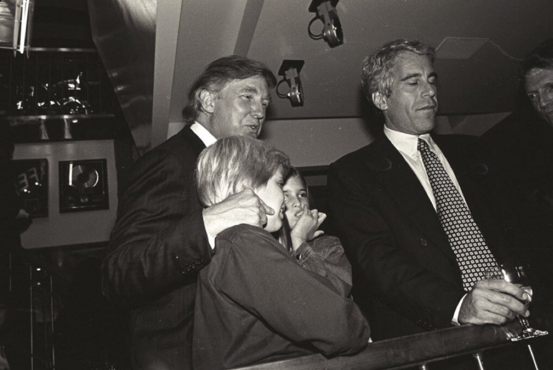 Donald Trump with children Eric and Ivanka in the company of Jeffrey Epstein