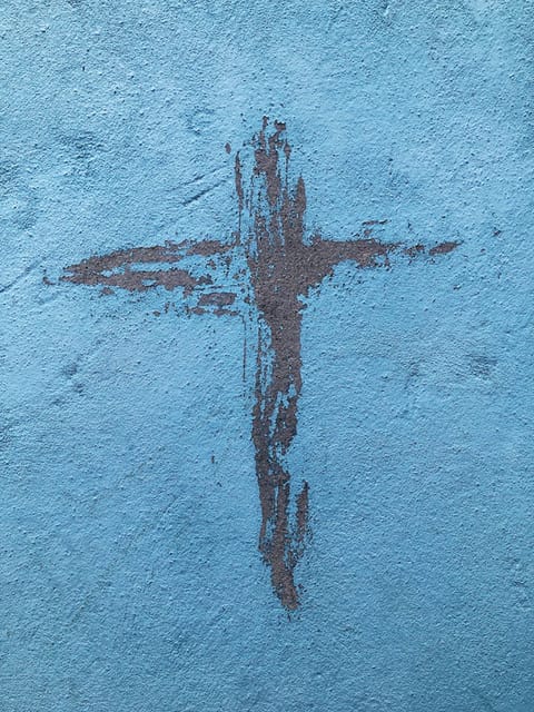 Cross painted on a wall